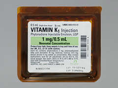 This is a yellow Ampul imprinted with nothing on the front, nothing on the back, and is manufactured by HOSPIRA/PFIZER.