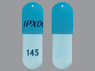 This is a Capsule Er imprinted with IPX066 on the front, 145 on the back.