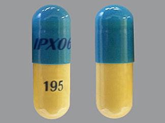This is a Capsule Er imprinted with IPX066 on the front, 195 on the back.