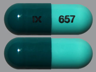 This is a Capsule imprinted with IX on the front, 657 on the back.