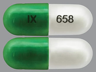 This is a Capsule imprinted with IX on the front, 658 on the back.