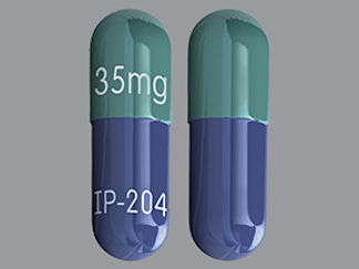 This is a Capsule imprinted with 35mg on the front, IP-204 on the back.