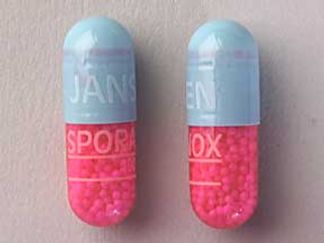 This is a Capsule imprinted with JANSSEN on the front, SPORANOX  100 on the back.