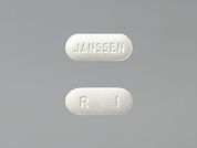 Risperdal: This is a Tablet imprinted with JANSSEN on the front, R  1 on the back.