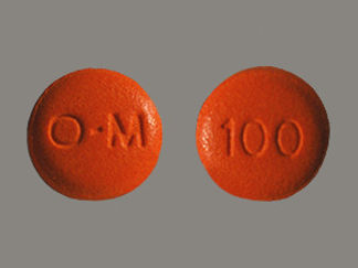 This is a Tablet imprinted with O-M on the front, 100 on the back.