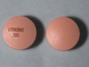 Lithobid: This is a Tablet Er imprinted with LITHOBID  300 on the front, nothing on the back.