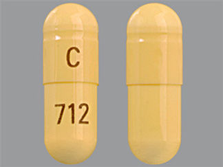 This is a Capsule imprinted with C on the front, 712 on the back.