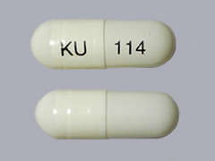 This is a white oblong Capsule Dr imprinted with KU on the front, 114 on the back, and is manufactured by CHARTWELL RX LL.