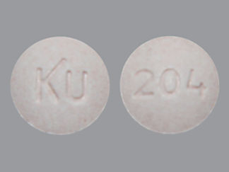 This is a Tablet Chewable imprinted with KU on the front, 204 on the back.