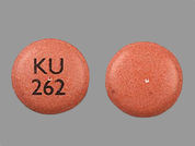 Nifedipine Er: This is a Tablet Er 24 Hr imprinted with KU  262 on the front, nothing on the back.