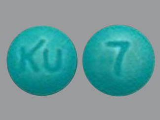 This is a Tablet Dr imprinted with KU on the front, 7 on the back.