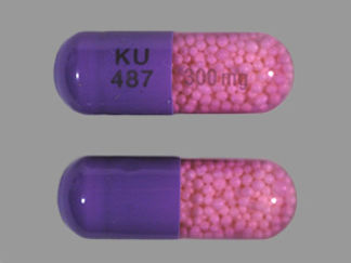 Esto es un Cápsula 24hr Er Unidades De Gránulos imprimido con KU  487 en la parte delantera, 300 mg en la parte posterior, y es fabricado por None.