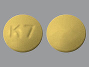 Cyclobenzaprine Hcl: This is a Tablet imprinted with K 7 on the front, nothing on the back.