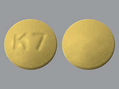 This is a yellow round Tablet imprinted with K 7 on the front, nothing on the back, and is manufactured by KVK-TECH, INC..