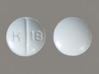 This is a Tablet imprinted with K 18 on the front, nothing on the back.