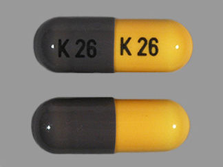 This is a Capsule imprinted with K 26 on the front, K 26 on the back.