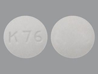 This is a Tablet Er imprinted with K 76 on the front, nothing on the back.