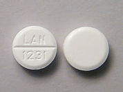 Primidone: This is a Tablet imprinted with LAN  1231 on the front, nothing on the back.