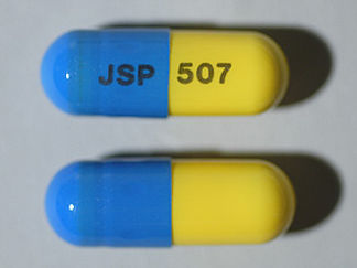 This is a Capsule imprinted with JSP on the front, 507 on the back.