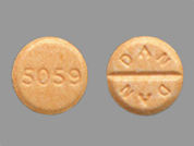 Millipred: This is a Tablet Dose Pack imprinted with DAN  DAN on the front, 5059 on the back.