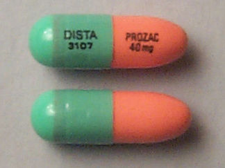 Esto es un Cápsula imprimido con DISTA  3107 en la parte delantera, PROZAC  40 mg en la parte posterior, y es fabricado por None.