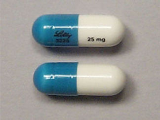 This is a Capsule imprinted with Lilly  3228 on the front, 25 mg on the back.