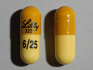 This is a Capsule imprinted with Lilly  3231 on the front, 6/25 on the back.
