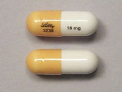 Strattera: Esto es un Cápsula imprimido con Lilly  3238 en la parte delantera, 18 mg en la parte posterior, y es fabricado por None.