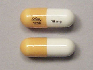 Esto es un Cápsula imprimido con Lilly  3238 en la parte delantera, 18 mg en la parte posterior, y es fabricado por None.