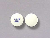 Zyprexa: Esto es un Tableta blanco redondo imprimido con LILLY  4112 en la parte delantera, nada en la parte posterior, y es fabricado por H2 PHARMA LLC.