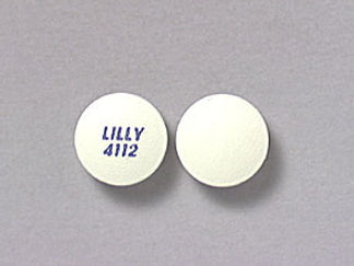 This is a Tablet imprinted with LILLY  4112 on the front, nothing on the back.