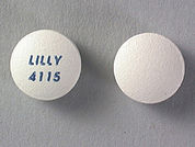 Zyprexa: This is a Tablet imprinted with LILLY  4115 on the front, nothing on the back.
