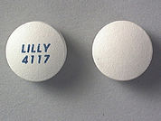 Zyprexa: This is a Tablet imprinted with LILLY  4117 on the front, nothing on the back.