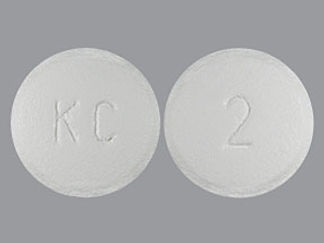 This is a Tablet imprinted with KC on the front, 2 on the back.