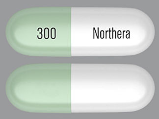 This is a Capsule imprinted with Northera on the front, 300 on the back.