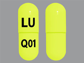 This is a Capsule Dr imprinted with LU on the front, Q01 on the back.