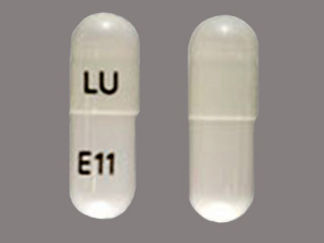 Esto es un Cápsula imprimido con LU en la parte delantera, E11 en la parte posterior, y es fabricado por None.