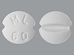 This is a white round Tablet imprinted with ML  60 on the front, nothing on the back, and is manufactured by MACLEODS PHARMA.