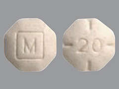 This is a white octagonal Tablet imprinted with M on the front, 20 on the back, and is manufactured by MALLINCK-SPECGX.