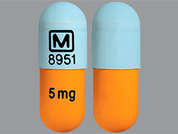 Dextroamphetamine-Amphet Er: This is a orange oblong Capsule Er 24 Hr imprinted with logo and 8951 on the front, 5 mg on the back, and is manufactured by MALLINCK-SPECGX.