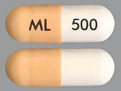 This is a Capsule imprinted with ML on the front, 500 on the back.