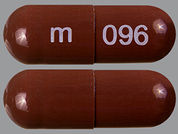 Disopyramide Phosphate: Esto es un Cápsula imprimido con m en la parte delantera, 096 en la parte posterior, y es fabricado por None.