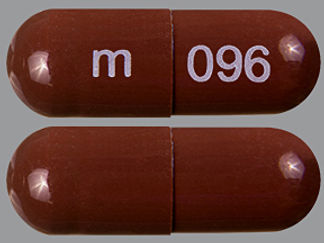 This is a Capsule imprinted with m on the front, 096 on the back.