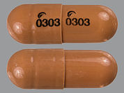 Dextroamphetamine Sulfate Er: This is a Capsule Er imprinted with logo and 0303 on the front, logo and 0303 on the back.