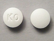 Non-Aspirin: Esto es un Tableta imprimido con K0 en la parte delantera, nada en la parte posterior, y es fabricado por None.