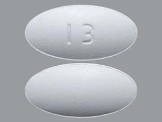 This is a Tablet imprinted with I3 on the front, nothing on the back.