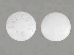 Esto es un Tableta blanco redondo imprimido con PRECOSE  50 en la parte delantera, nada en la parte posterior, y es fabricado por BAYER,PHARM DIV.