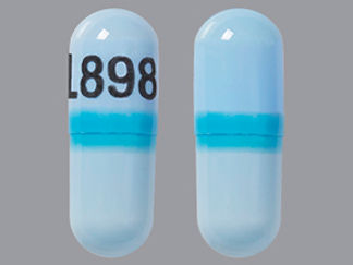 This is a Capsule Dr imprinted with L898 on the front, nothing on the back.