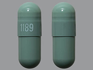 This is a Capsule Er 24 Hr imprinted with 1189 on the front, nothing on the back.