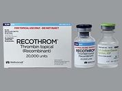 Recothrom: This is a Vial imprinted with nothing on the front, nothing on the back.